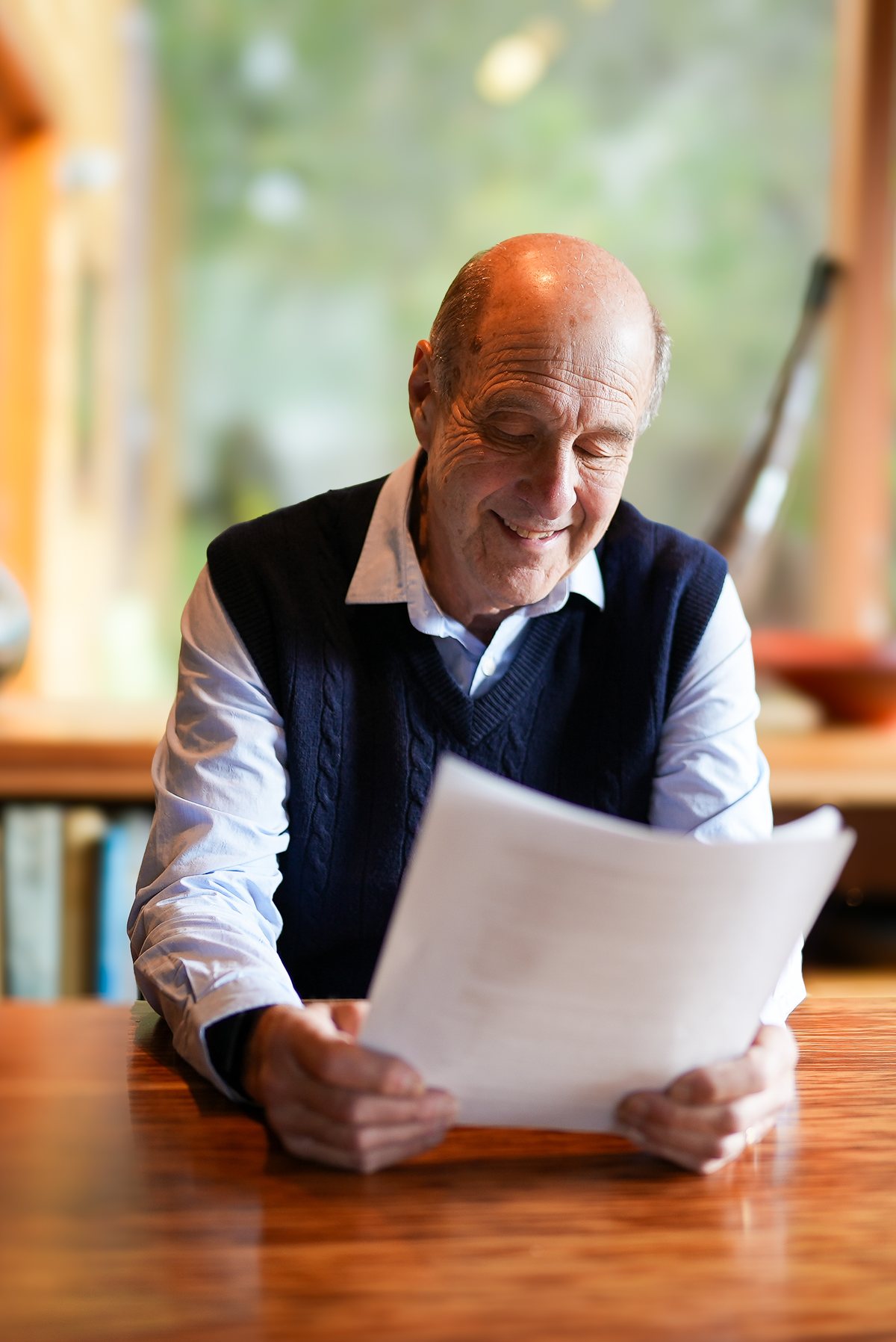 Dr. David Spiegel reading at his desk